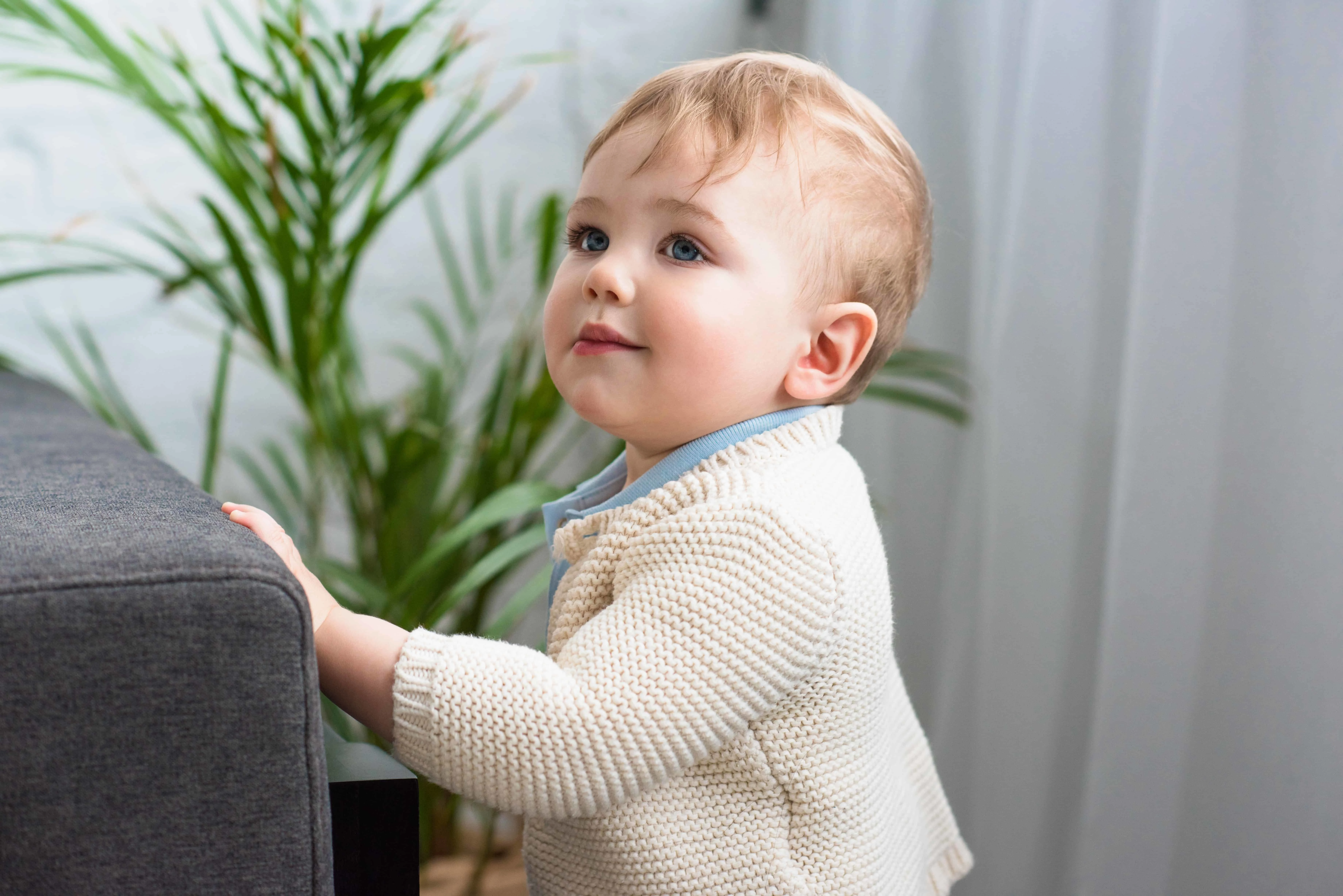 when can babies stand without support