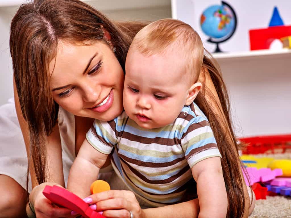 Teaching baby to point with toys