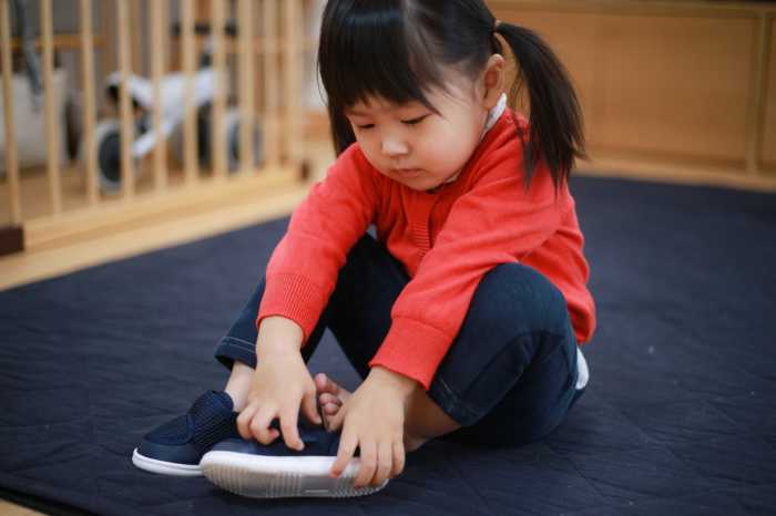 Toddler Putting on shoes