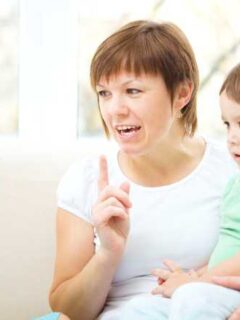 mom talking to two children