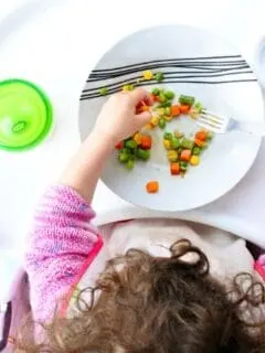 toddler eating food