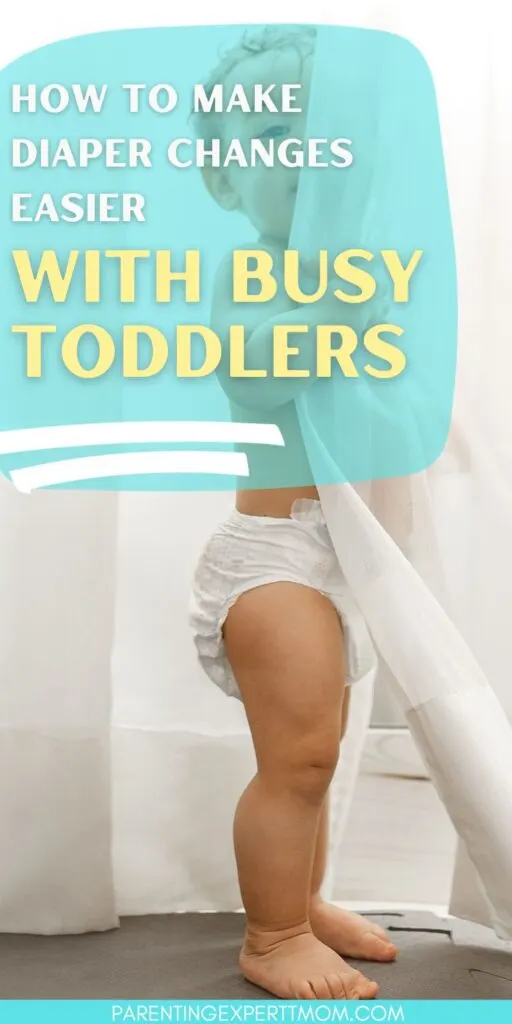 toddler in diaper hiding behind a curtain with text overlay:  How to make diaper changes easier with a busy toddlers
