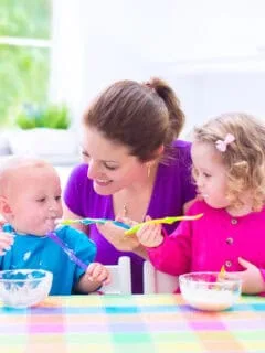 mom feeding toddler